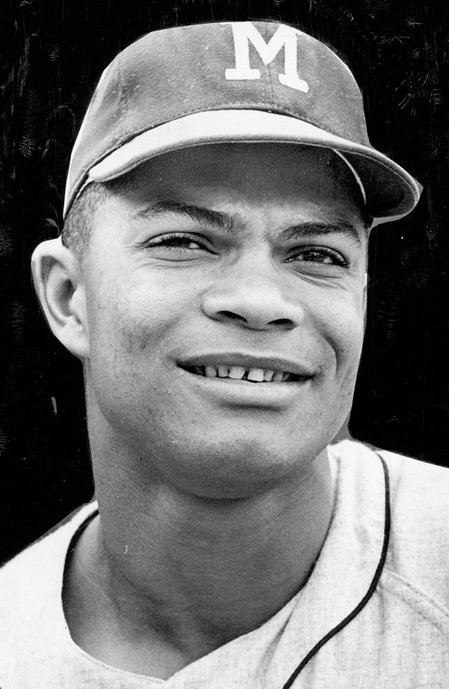 Head and shoulders portrait of Felipe Alou in Braves uniform