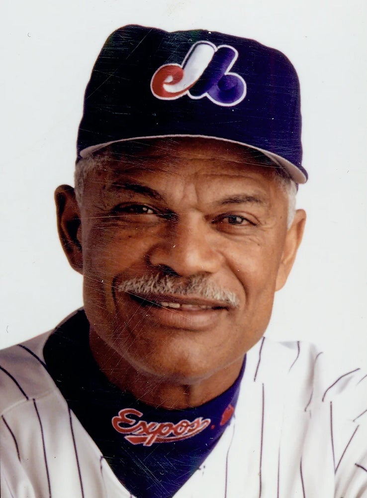 Head and shoulders portrait of Felipe Alou in Expos uniform